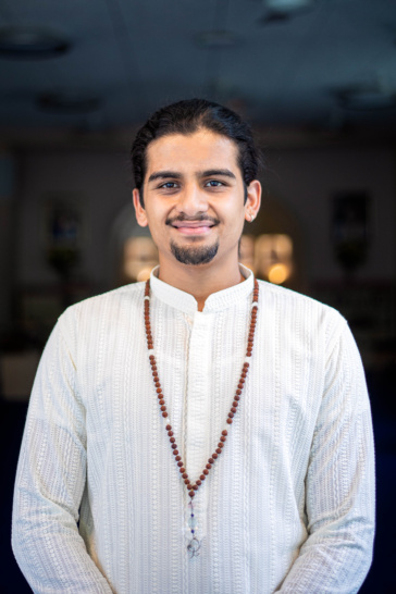 Shivendra in temple subtly smiling