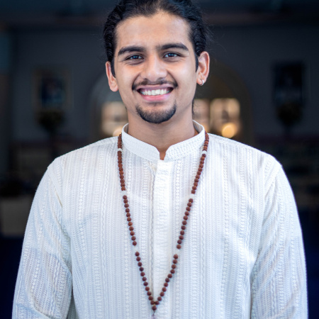 Shivendra in temple smiling